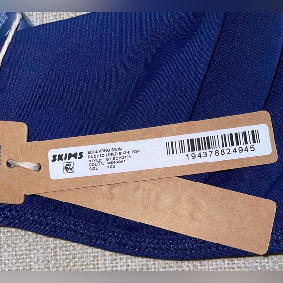 4. SKIMS Sculpting Swim Ruched Top - Picture 7 of 7